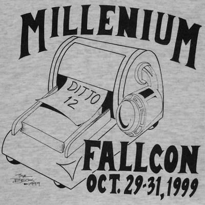 Shirt reads 'Millenium Fallcon, Ditto 12, Oct. 29-31, 1999' and has a picture of some sort of a cross between the Millenium Falcon and a duplicator. Art credit: The Beck 1999