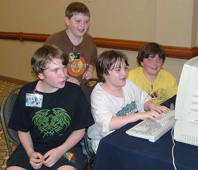 Four kids playing Scorched Earth at
Minicon 41