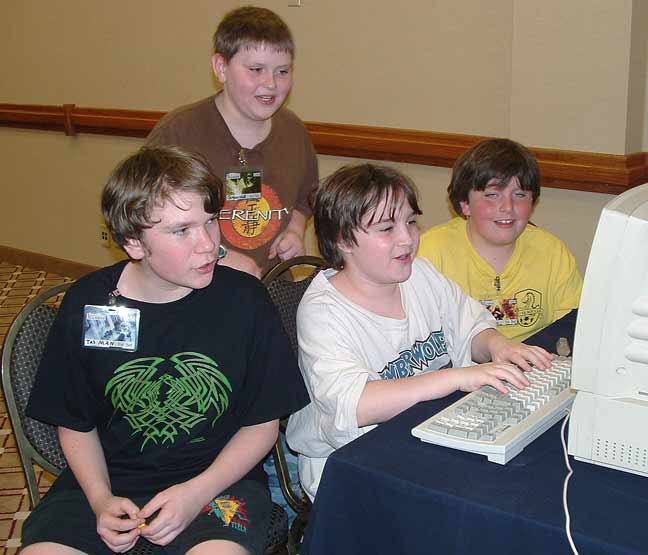 Four kids playing Scorched Earth at Minicon 41