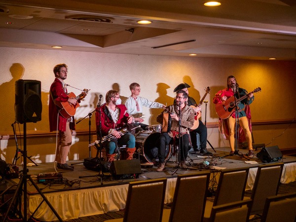 A band on stage at Minicon