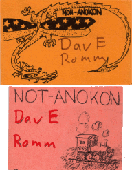Two Not-Anokon badges.  One has a dragon and the other has a train.  Both say 'Not-Anokon' and have 'DavE Romm' written in by hand.